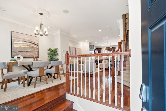44521/2 Macarthur Blvd NW, Washington, DC 20007 - staircase with crown molding, recessed lighting, a chandelier, and wood finished floors