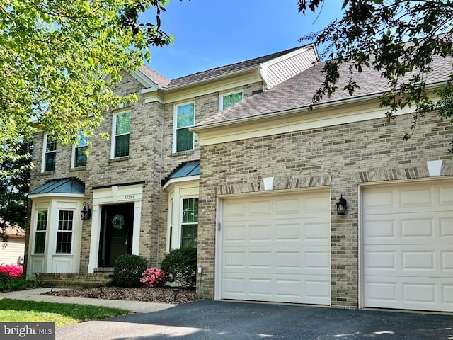 43253 Katie Leigh Ct, Ashburn, VA 20147 - view of front of house with driveway and brick siding