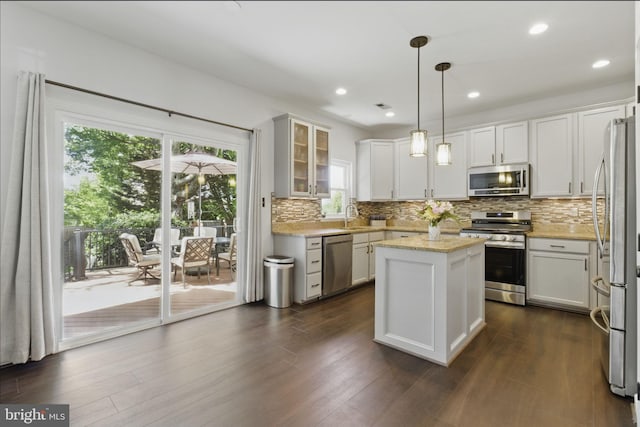 43253 Katie Leigh Ct, Ashburn, VA 20147 - kitchen featuring appliances with stainless steel finishes, tasteful backsplash, white cabinets, dark wood finished floors, and recessed lighting