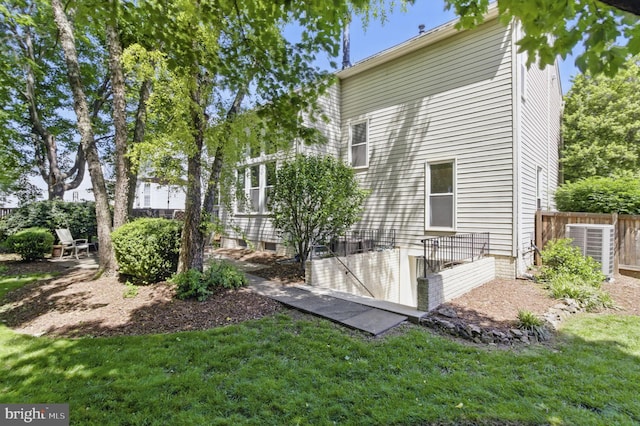 43253 Katie Leigh Ct, Ashburn, VA 20147 - rear view of property featuring central AC