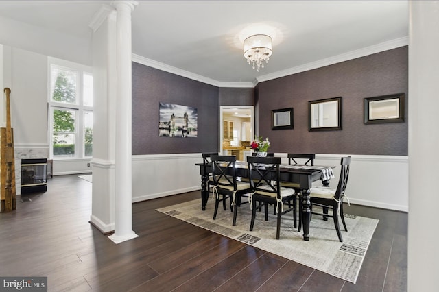 43253 Katie Leigh Ct, Ashburn, VA 20147 - dining space featuring ornate columns, wood finished floors, wainscoting, ornamental molding, and an accent wall