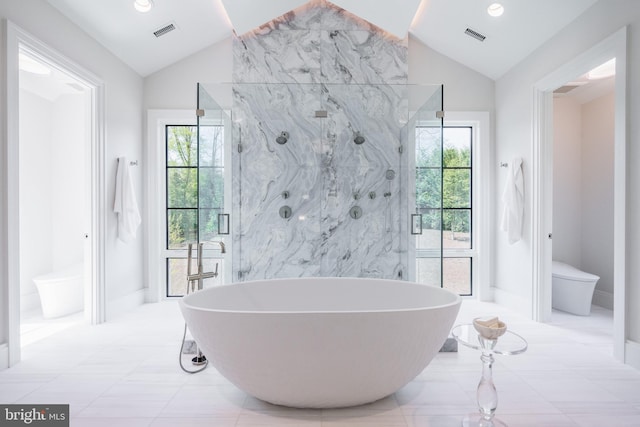 full bathroom featuring plenty of natural light, visible vents, toilet, and lofted ceiling