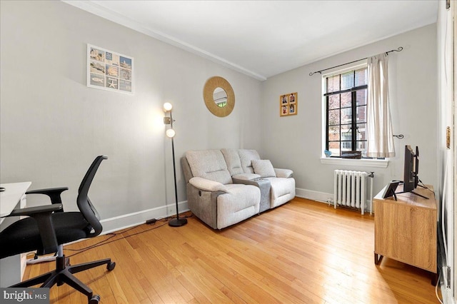 1305 Broom St Unit 105, Wilmington, DE 19806 - office area with baseboards, radiator heating unit, crown molding, and hardwood / wood-style flooring