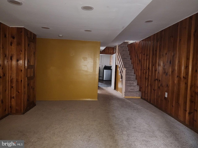 1018 N Bentalou St, Baltimore, MD 21216 - finished below grade area with stairway, wood walls, washer / clothes dryer, and carpet floors