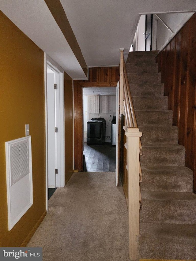 1018 N Bentalou St, Baltimore, MD 21216 - stairway featuring washing machine and dryer, visible vents, and carpet