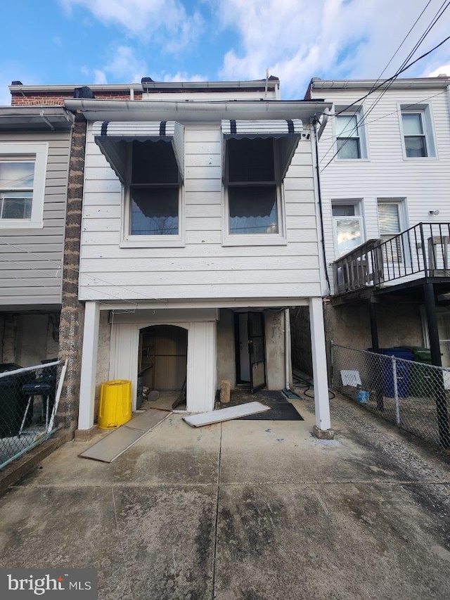 1018 N Bentalou St, Baltimore, MD 21216 - rear view of property with fence