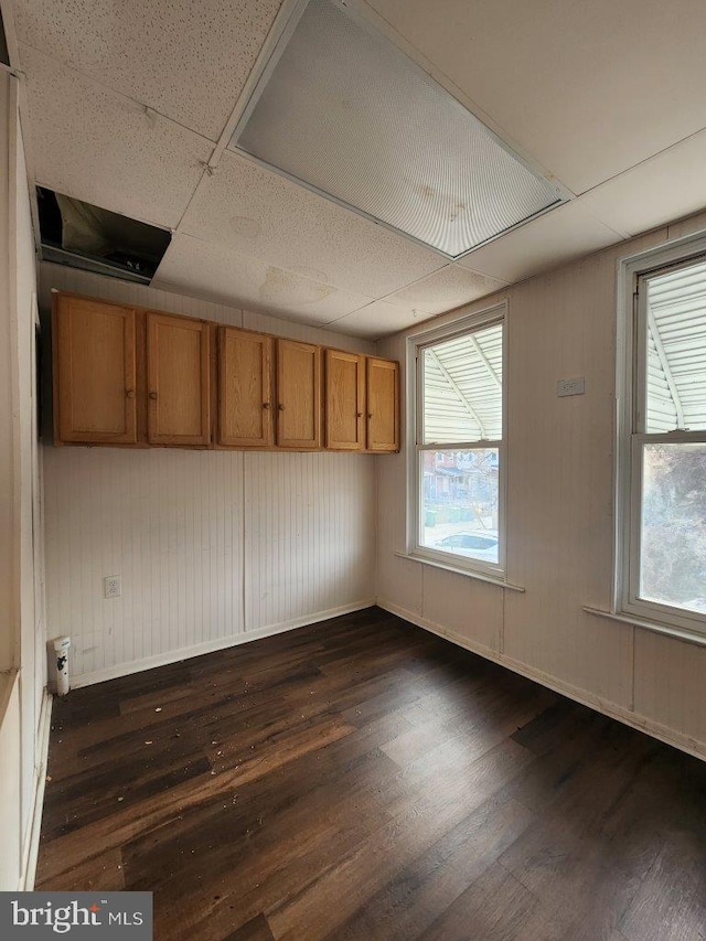 1018 N Bentalou St, Baltimore, MD 21216 - empty room with baseboards, a healthy amount of sunlight, and dark wood finished floors