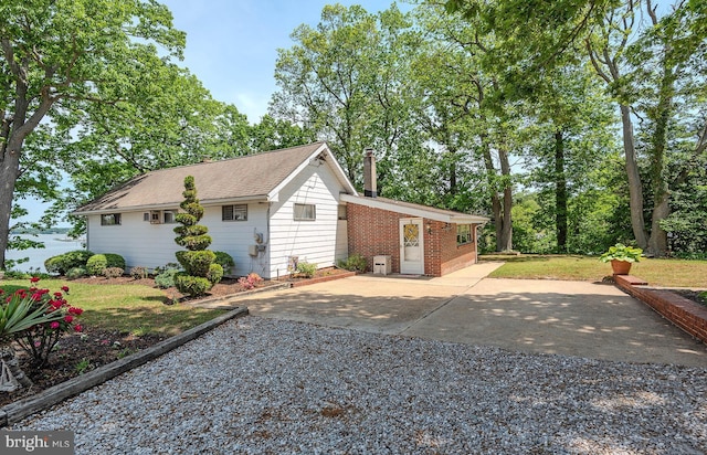 424 Alameda Pkwy, Arnold, MD 21012 - view of property exterior with gravel driveway and a chimney