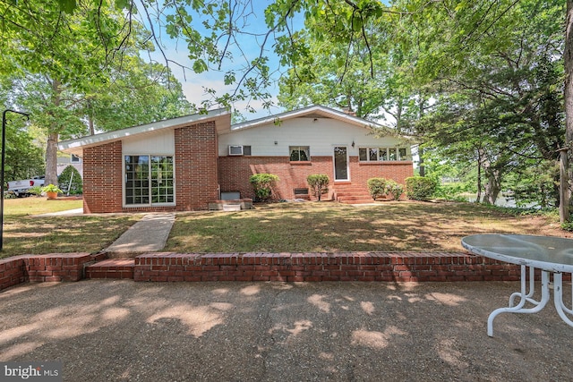 424 Alameda Pkwy, Arnold, MD 21012 - rear view of house featuring brick siding, entry steps, a yard, and a patio area