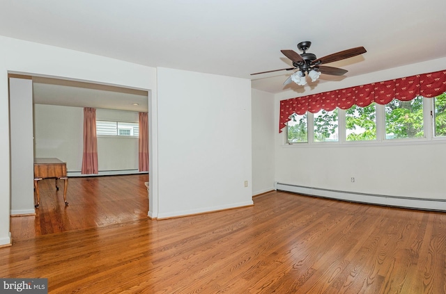 424 Alameda Pkwy, Arnold, MD 21012 - spare room featuring ceiling fan, wood finished floors, baseboard heating, and baseboards