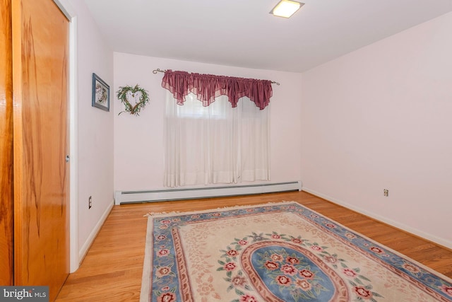 424 Alameda Pkwy, Arnold, MD 21012 - unfurnished room with a baseboard radiator, light wood finished floors, and baseboards