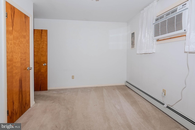 424 Alameda Pkwy, Arnold, MD 21012 - carpeted spare room with a baseboard heating unit, an AC wall unit, and baseboards