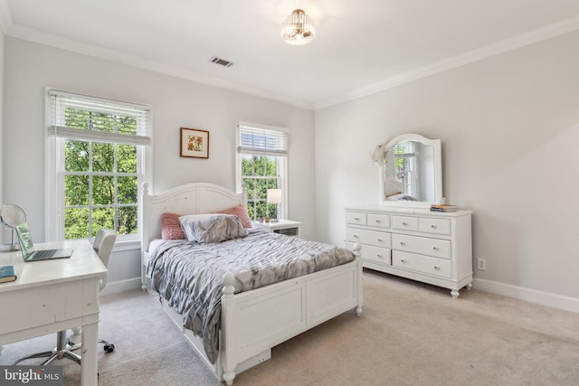 bedroom with baseboards, ornamental molding, visible vents, and light colored carpet