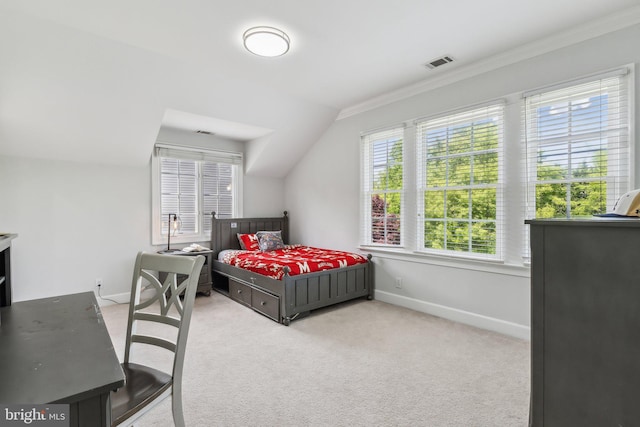bedroom with crown molding, visible vents, baseboards, and light carpet