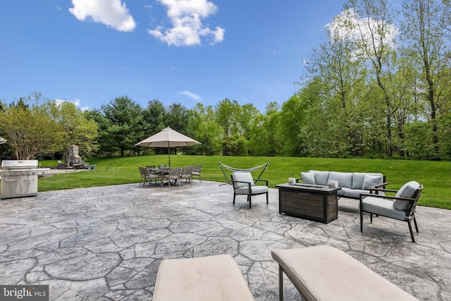 view of patio with outdoor dining area, a grill, and an outdoor living space