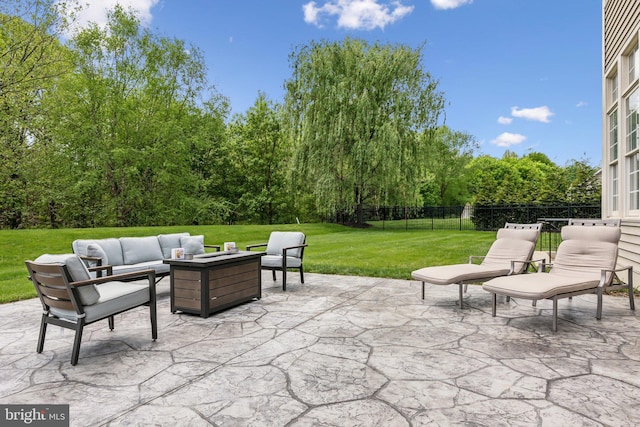 view of patio / terrace with an outdoor hangout area and fence