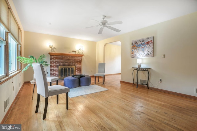 7423 Phelps Rd, Hanover, MD 21076 - living room with wood finished floors and a fireplace