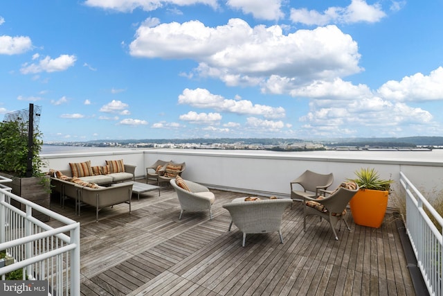925 N Fairfax St Unit 704, Alexandria, VA 22314 - wooden deck with an outdoor living space and a water view