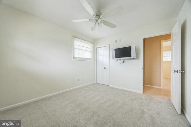 809 W 3rd Ave, Runnemede, NJ 08078 - empty room featuring a ceiling fan, baseboards, and light colored carpet