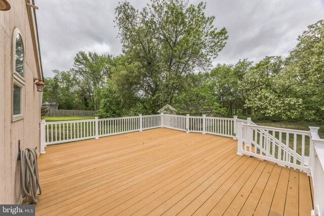 809 W 3rd Ave, Runnemede, NJ 08078 - wooden deck with view of scattered trees and fence