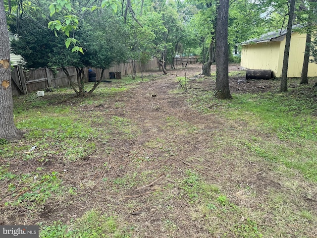 view of yard featuring fence