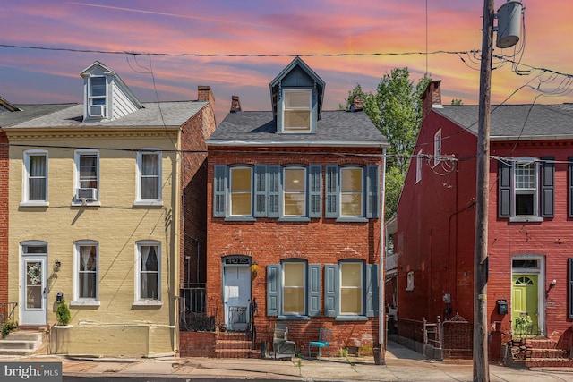 442 Poplar St, Lancaster, PA 17603 - view of property featuring brick siding and cooling unit