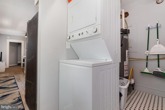 442 Poplar St, Lancaster, PA 17603 - laundry room with stacked washer / dryer, gas water heater, and ceiling fan
