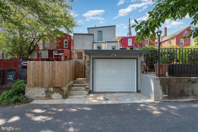 442 Poplar St, Lancaster, PA 17603 - view of front facade with a garage and driveway