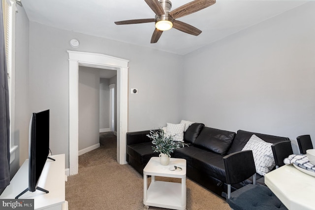 442 Poplar St, Lancaster, PA 17603 - living room featuring light colored carpet, ceiling fan, and baseboards