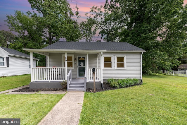 59 Transverse Ave, Middle River, MD 21220 - view of front facade featuring a porch and roof with shingles
