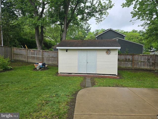 view of shed featuring a fenced backyard