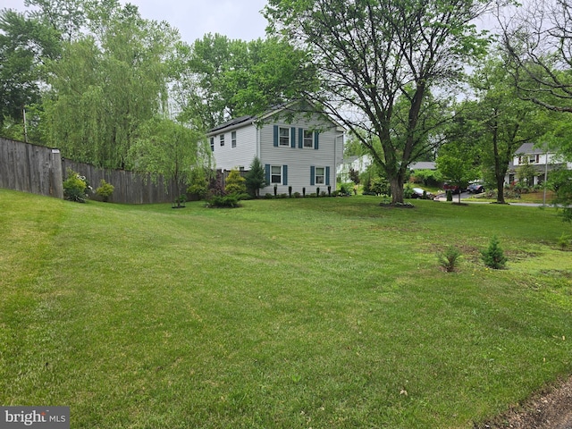 view of yard with fence