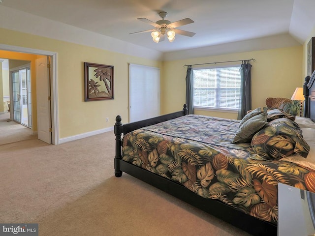 bedroom featuring light carpet, baseboards, and a ceiling fan