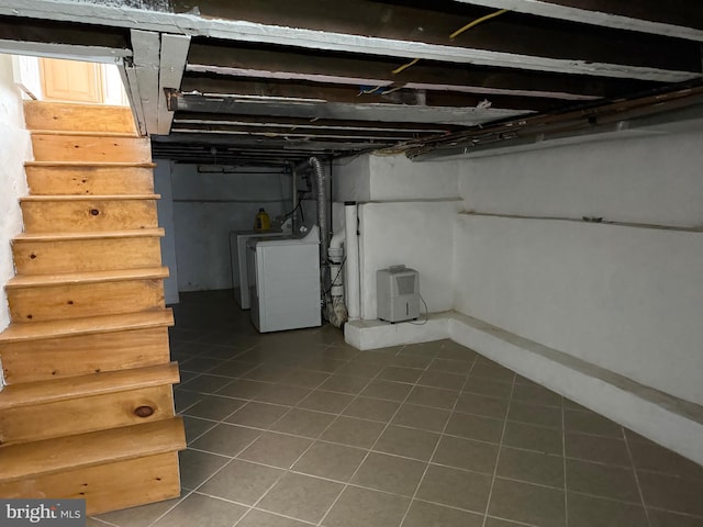 2302 E Albert St, Philadelphia, PA 19125 - unfinished below grade area with stairs, washer / dryer, and tile patterned floors