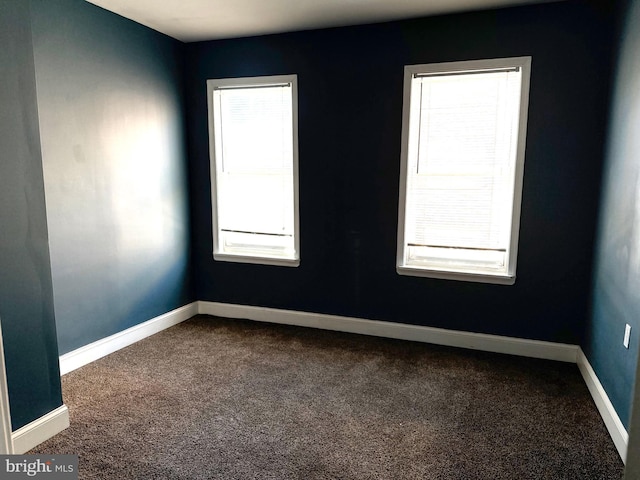 2302 E Albert St, Philadelphia, PA 19125 - spare room featuring baseboards and dark carpet