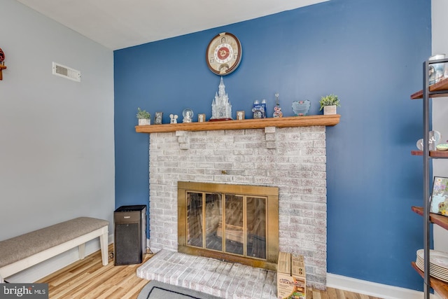 33 Miracle Dr, Williamstown, NJ 08094 - detailed view of wood finished floors, a fireplace, and baseboards