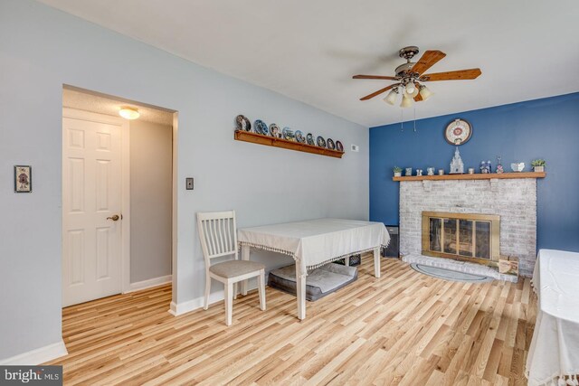 33 Miracle Dr, Williamstown, NJ 08094 - dining area featuring ceiling fan, wood finished floors, a fireplace, and baseboards