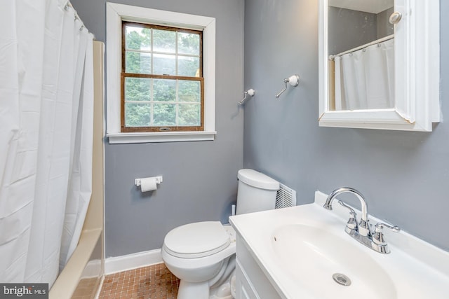 33 Miracle Dr, Williamstown, NJ 08094 - bathroom featuring toilet, baseboards, tile patterned flooring, vanity, and shower / bath combo with shower curtain