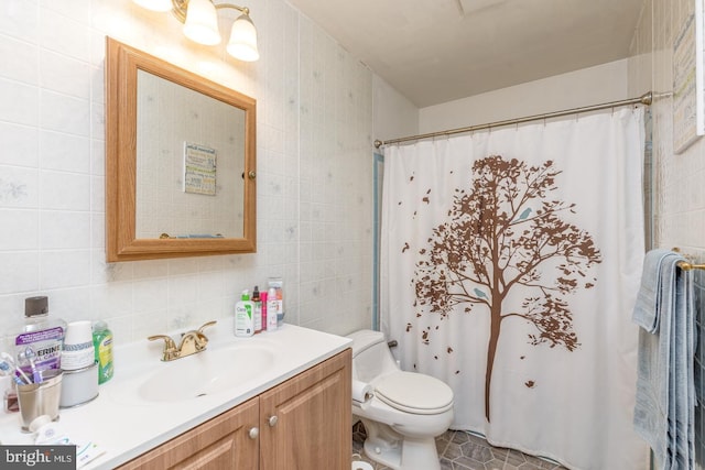 33 Miracle Dr, Williamstown, NJ 08094 - bathroom with tile walls, vanity, toilet, decorative backsplash, and a shower with shower curtain