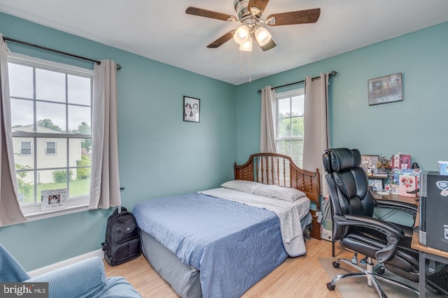 33 Miracle Dr, Williamstown, NJ 08094 - bedroom with wood finished floors, a desk, and a ceiling fan