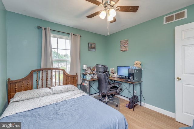 33 Miracle Dr, Williamstown, NJ 08094 - bedroom with wood finished floors, baseboards, a ceiling fan, and an office area