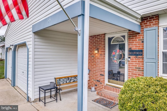 33 Miracle Dr, Williamstown, NJ 08094 - property entrance with covered porch and brick siding