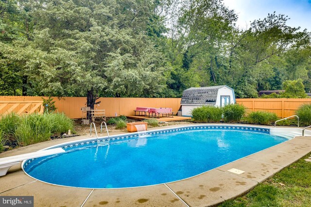 33 Miracle Dr, Williamstown, NJ 08094 - view of pool featuring a fenced backyard and a diving board