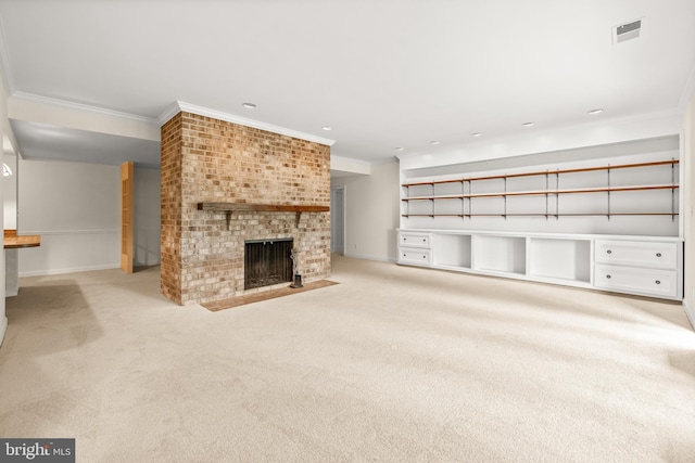 unfurnished living room with ornamental molding, carpet flooring, and visible vents