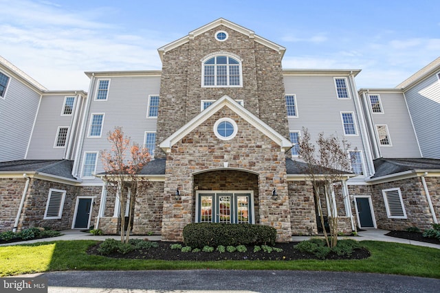 view of front of home with stone siding
