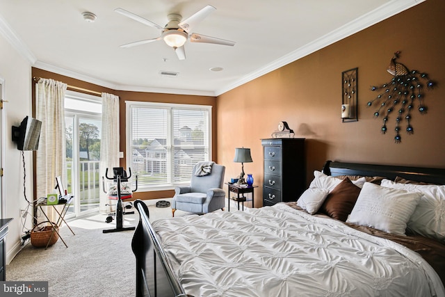 carpeted bedroom with ceiling fan, visible vents, access to exterior, and ornamental molding