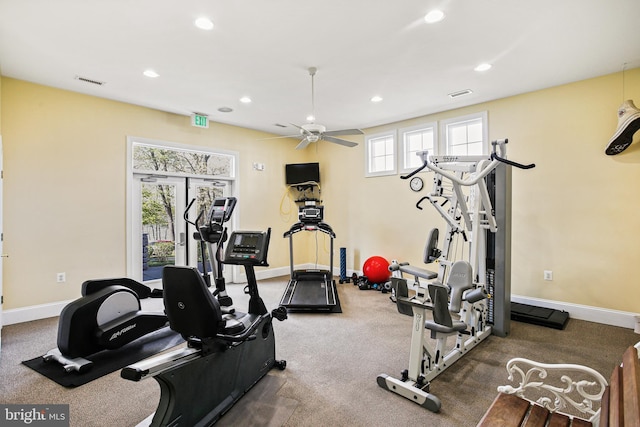 workout area featuring visible vents, a healthy amount of sunlight, and recessed lighting