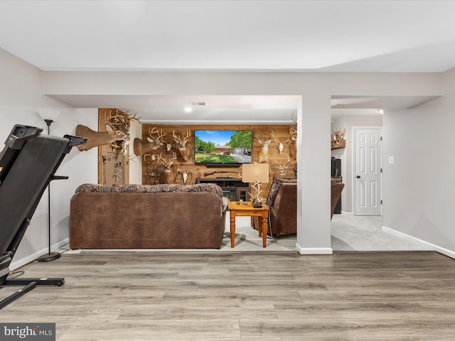 living room with wood finished floors and baseboards