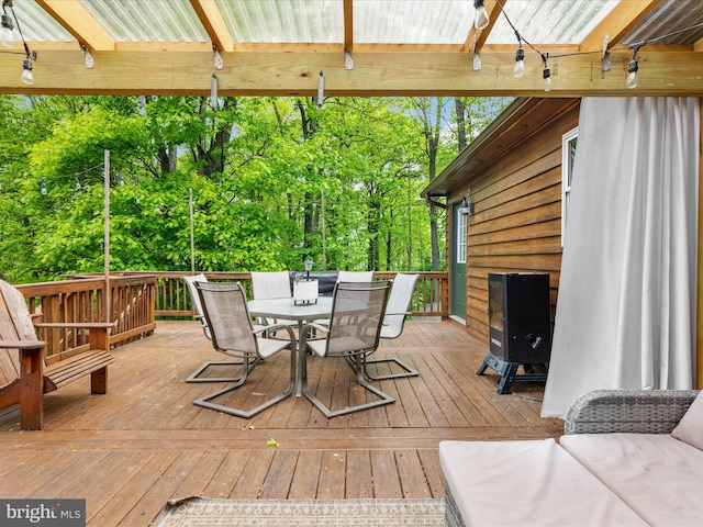 deck featuring outdoor dining space