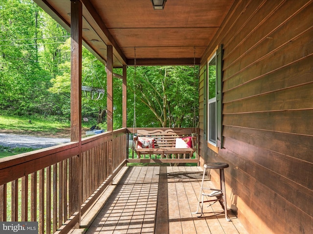 wooden terrace with covered porch